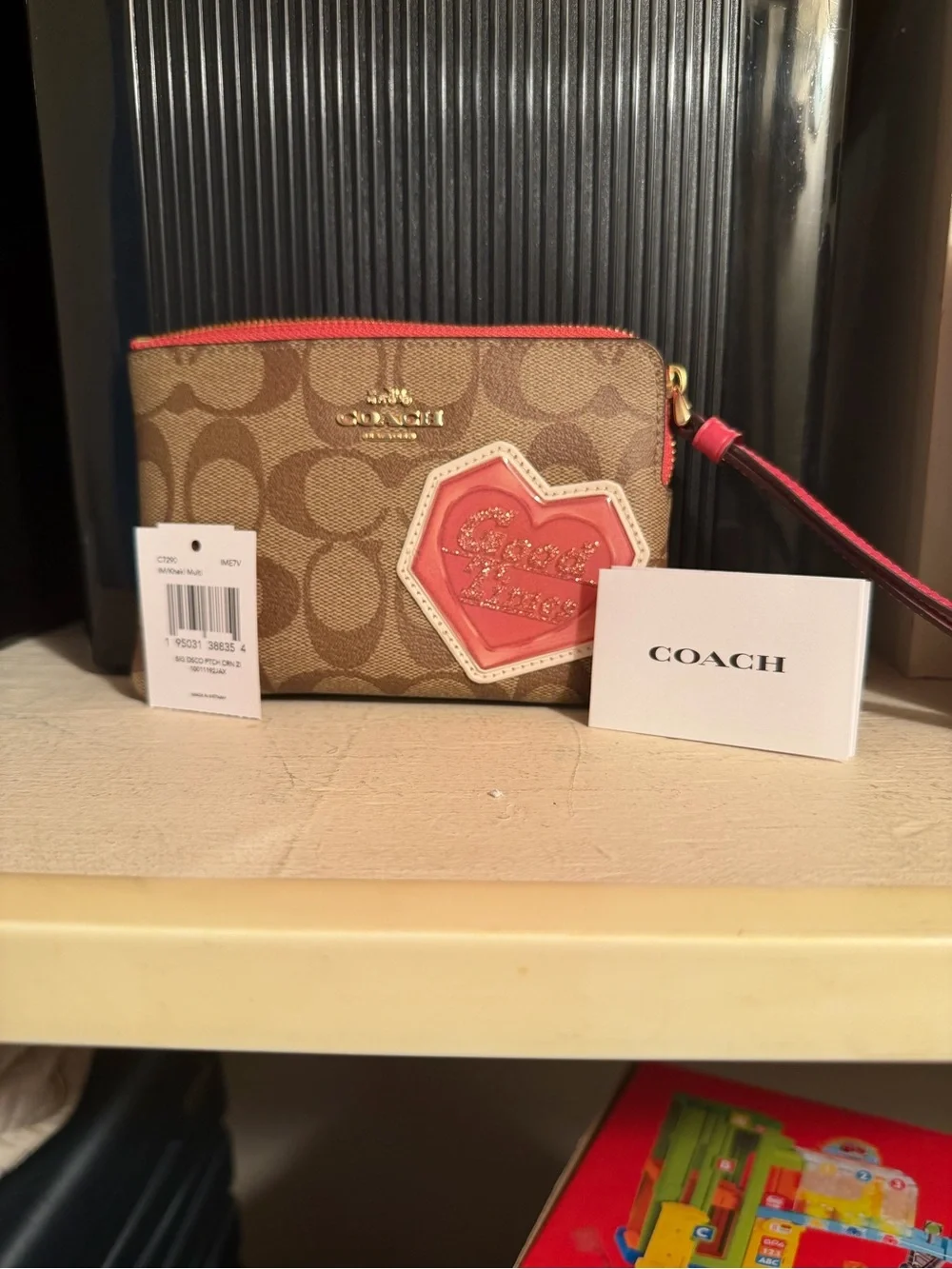 Coach signature coated